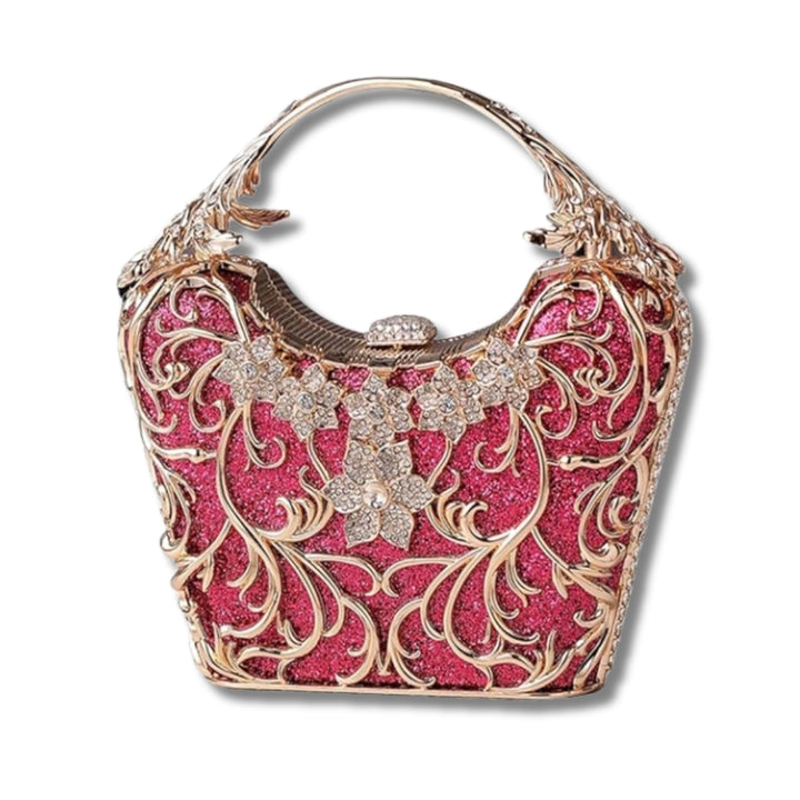 Bolsa clutch festa vermelha com acabamento metálico rendado, alça rígida escultural e aplicação de flores em strass, design exuberante e sofisticado – loja Bolsa Clutch