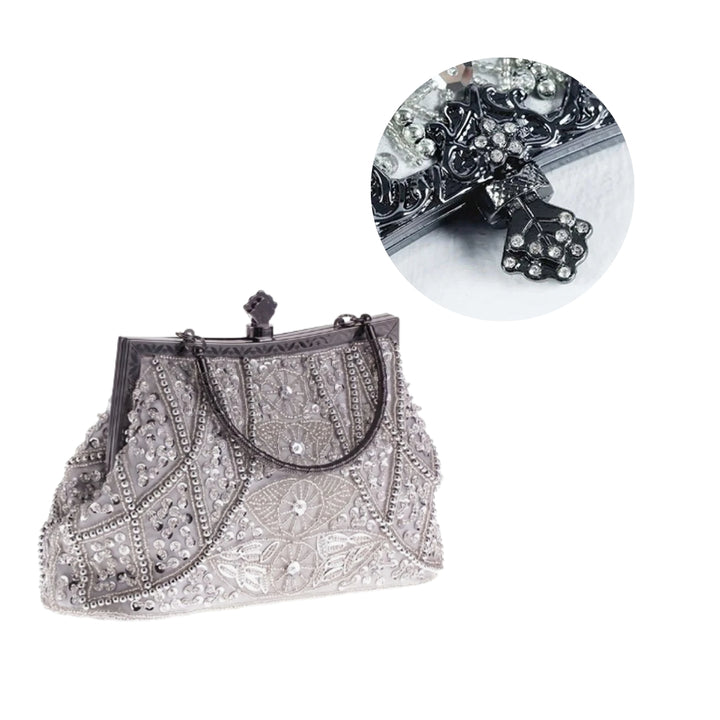 Bolsa de festa prata com bordado artesanal em miçangas e alça curta de mão - loja Bolsa Clutch